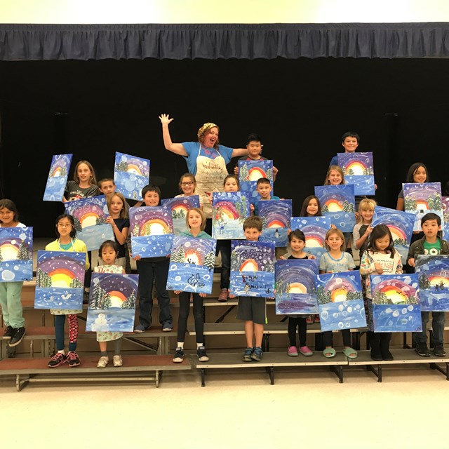 The PTA's Family Art Night is a success! Look at all those colorful paintings!