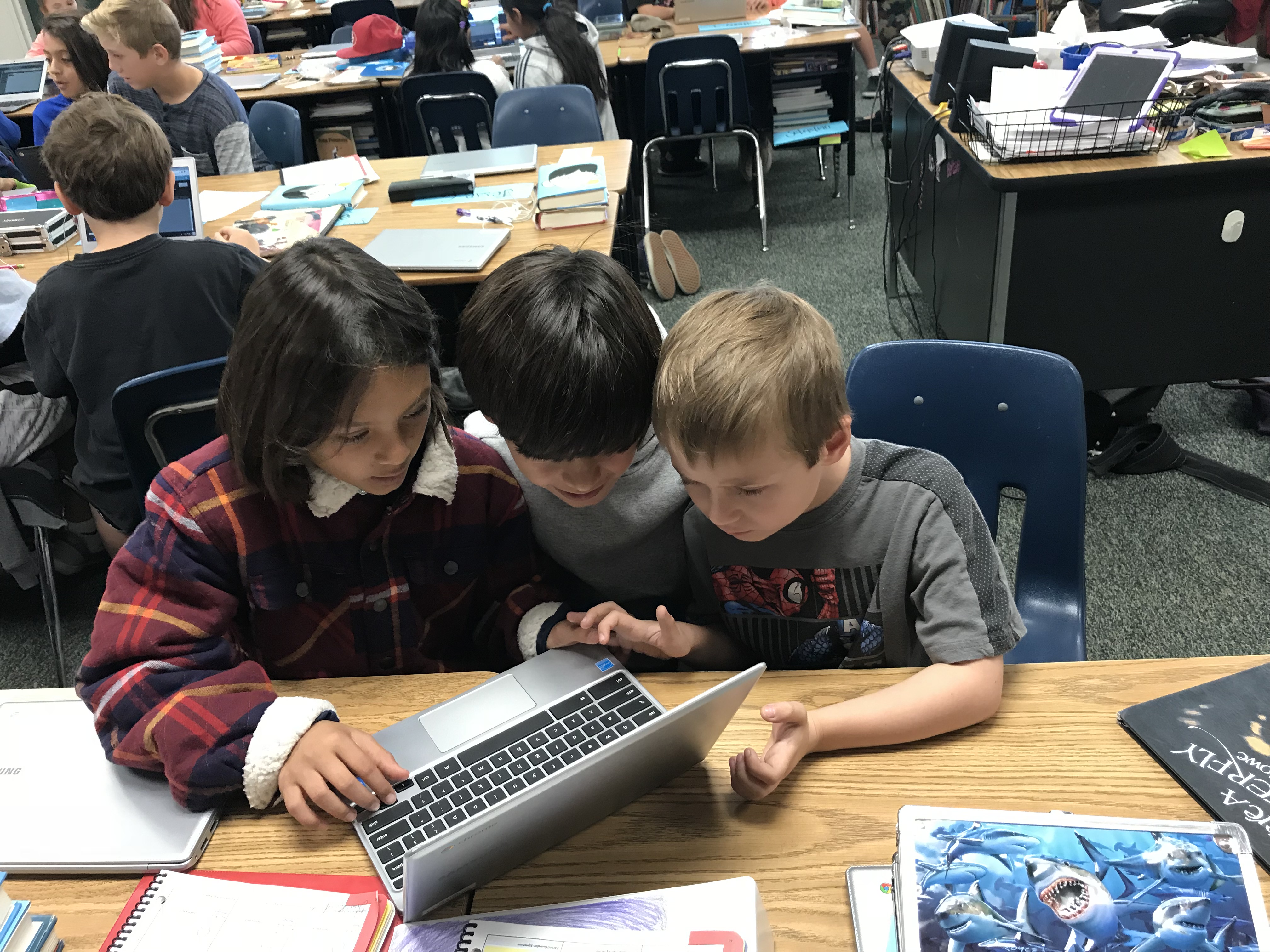 Thanks sixth graders for doing an outstanding job teaching the first graders how to code!