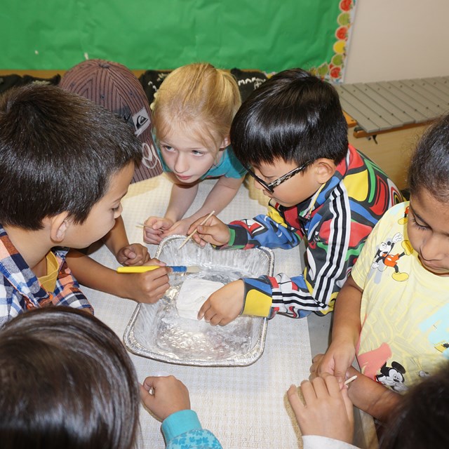 These young archaeologists are excited to learn about identifying ancient fossils!